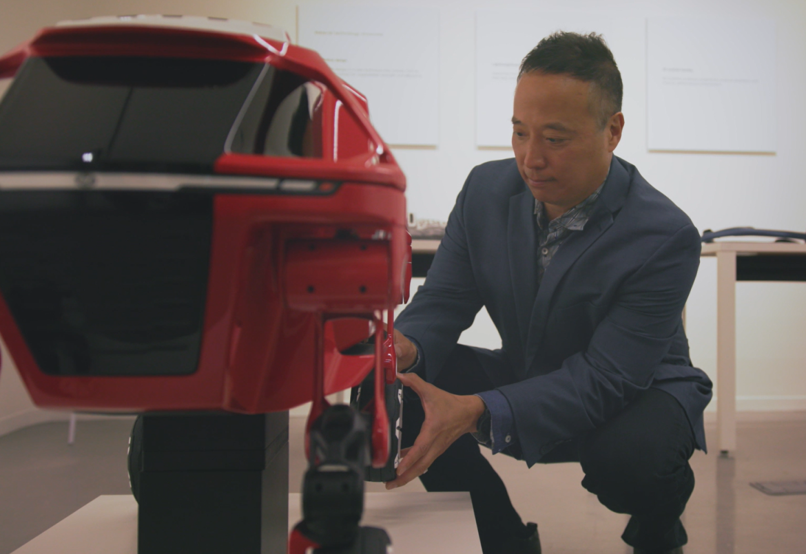 John Suh, Hyundai’s founding director of the company’s New Horizons Studio, examines components of the Elevate prototype that need to be exceedingly strong and light.
