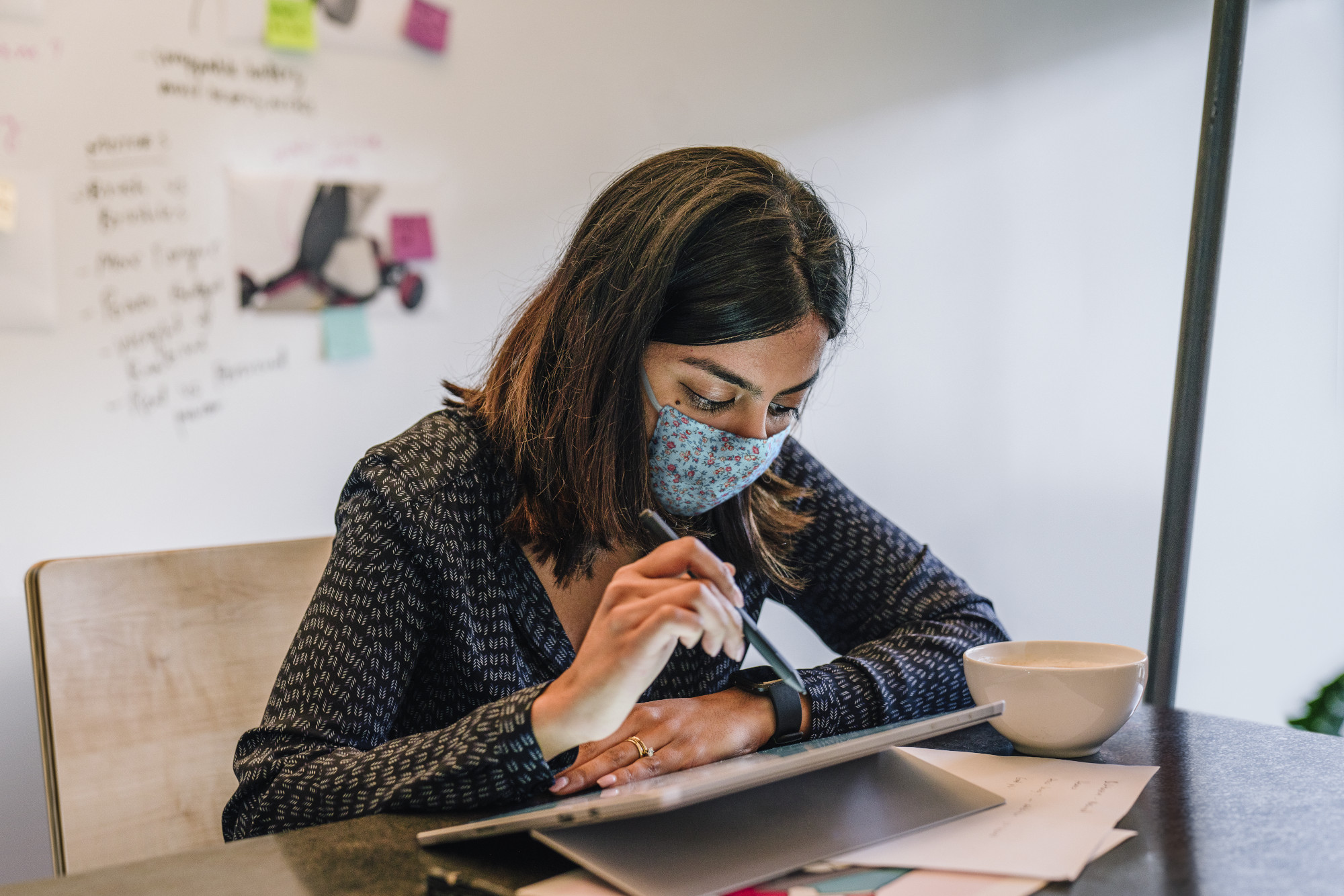 woman working on a tablet 