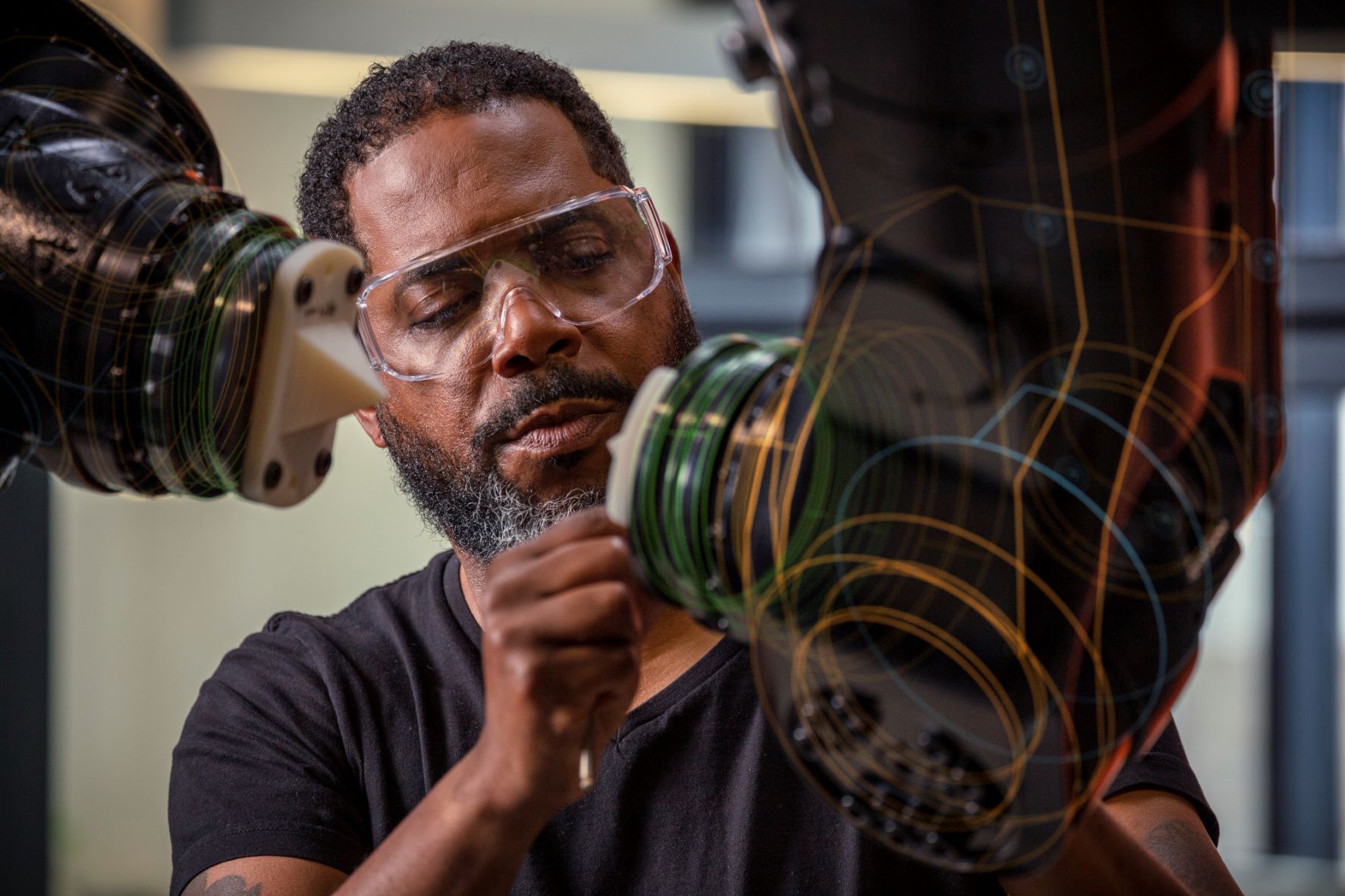 Man working in the robotics lab at the Autodesk San Francisco Technology Center.