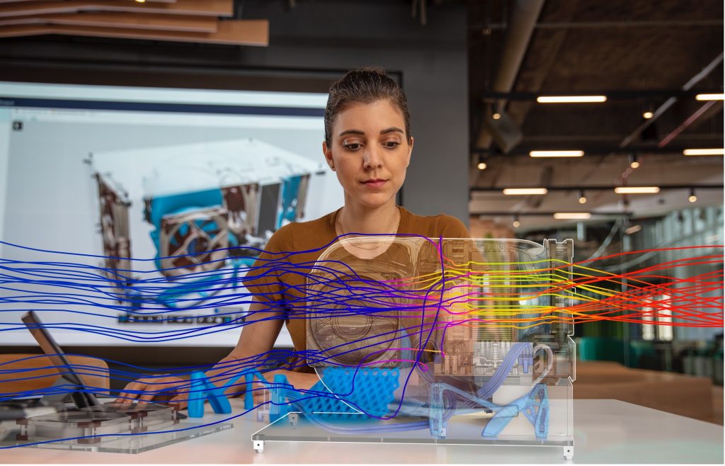 Woman working with design data on computer. 