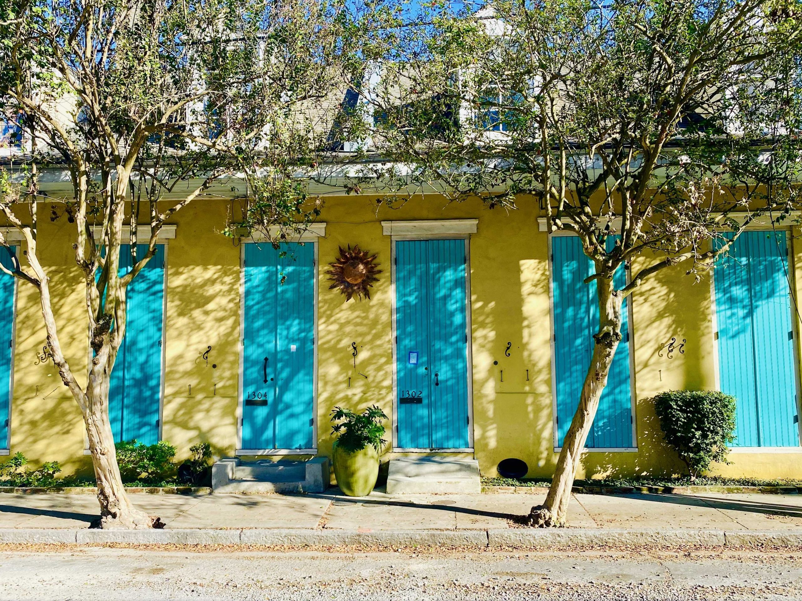 Yellow building with blue doors