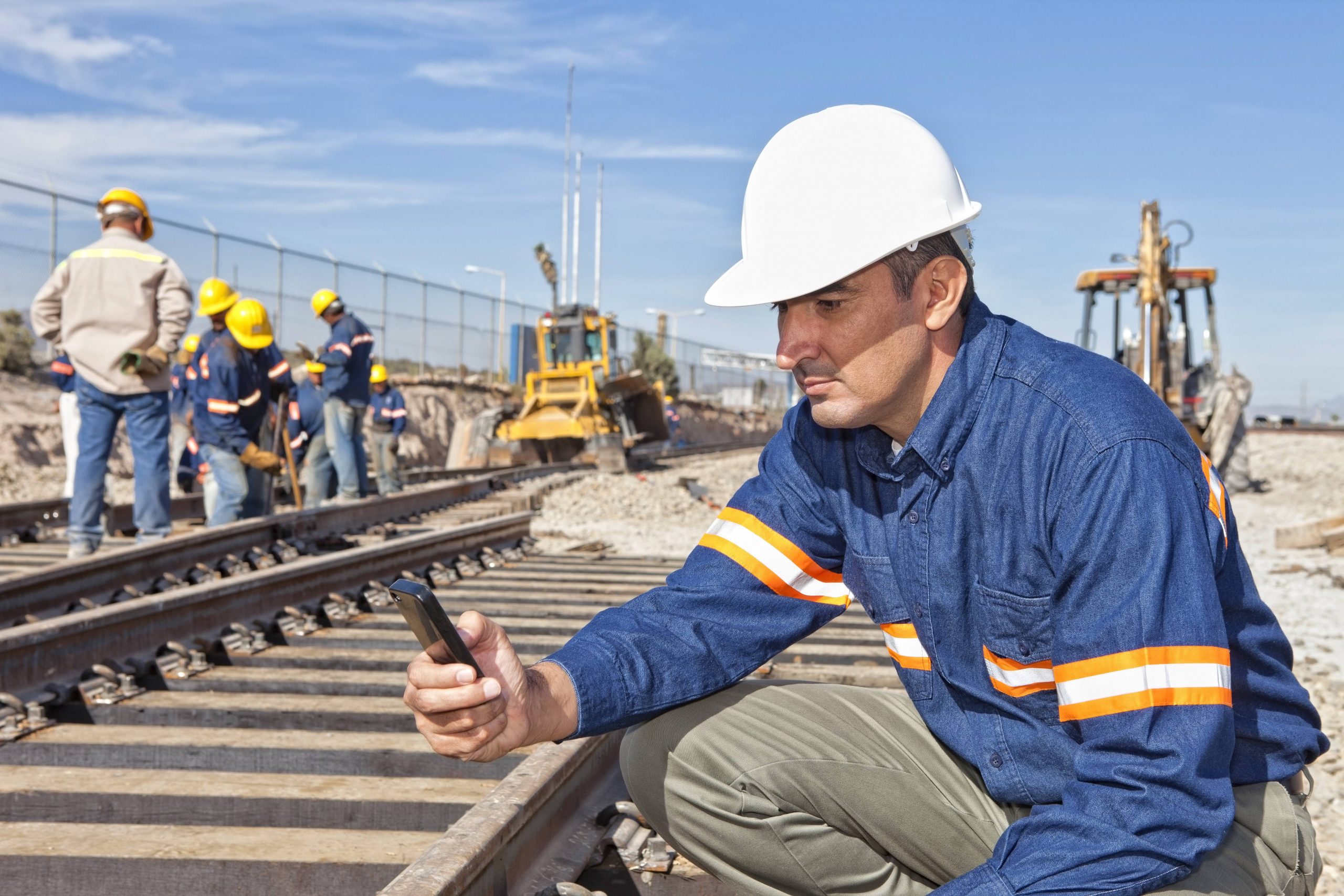 Engineer at a rail construction site.