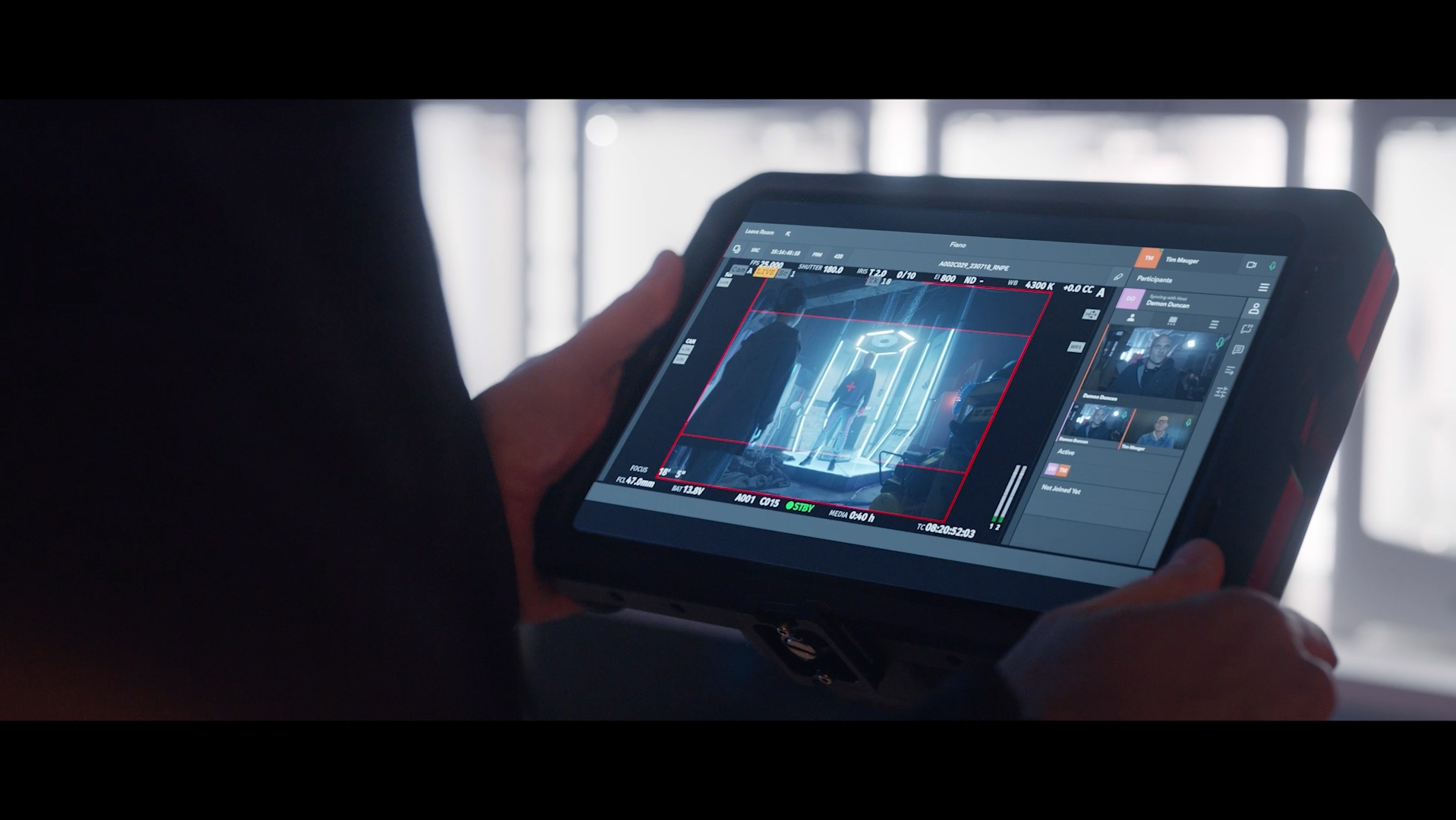 a tablet screen showing a movie scene